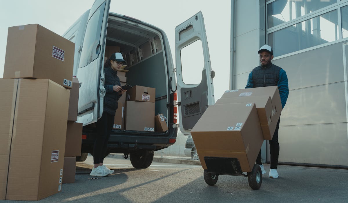 Ofetech delivery team unloading cargo van
